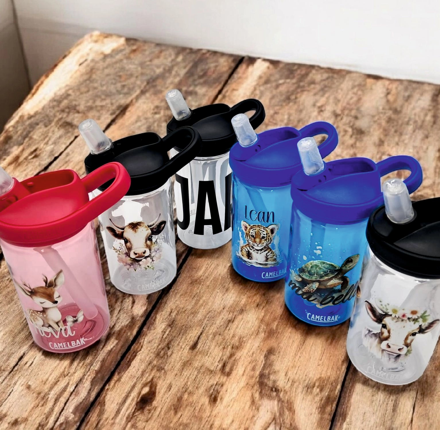 wunderschöne farbige trinkflaschen mit schönen  motiven und wunschnamen personalisiert