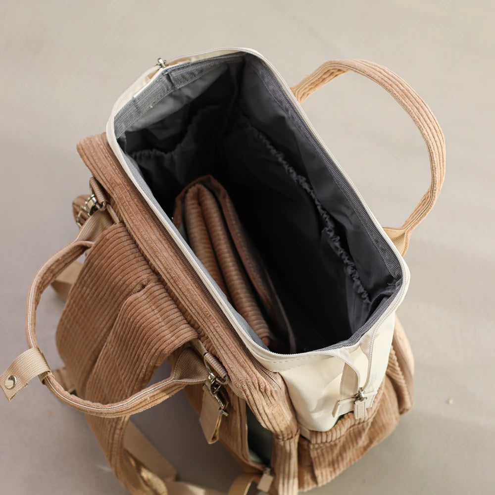 Wickelrucksack Cord in braun mit veganem Leder